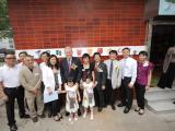 All guests pictured in front of the new centre